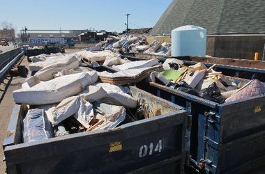 hundreds of discarded mattresses in Edison, NJ