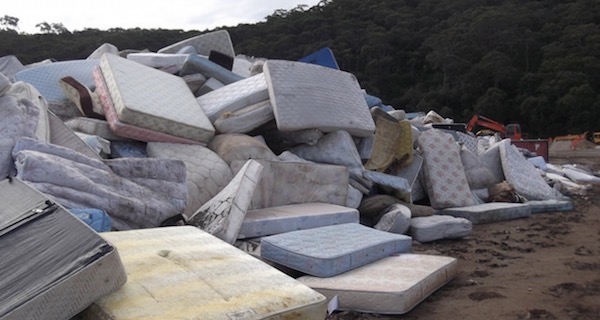 A lot of old mattresses piled up